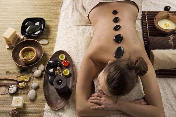 Hot Stones Massage therapy at a spa